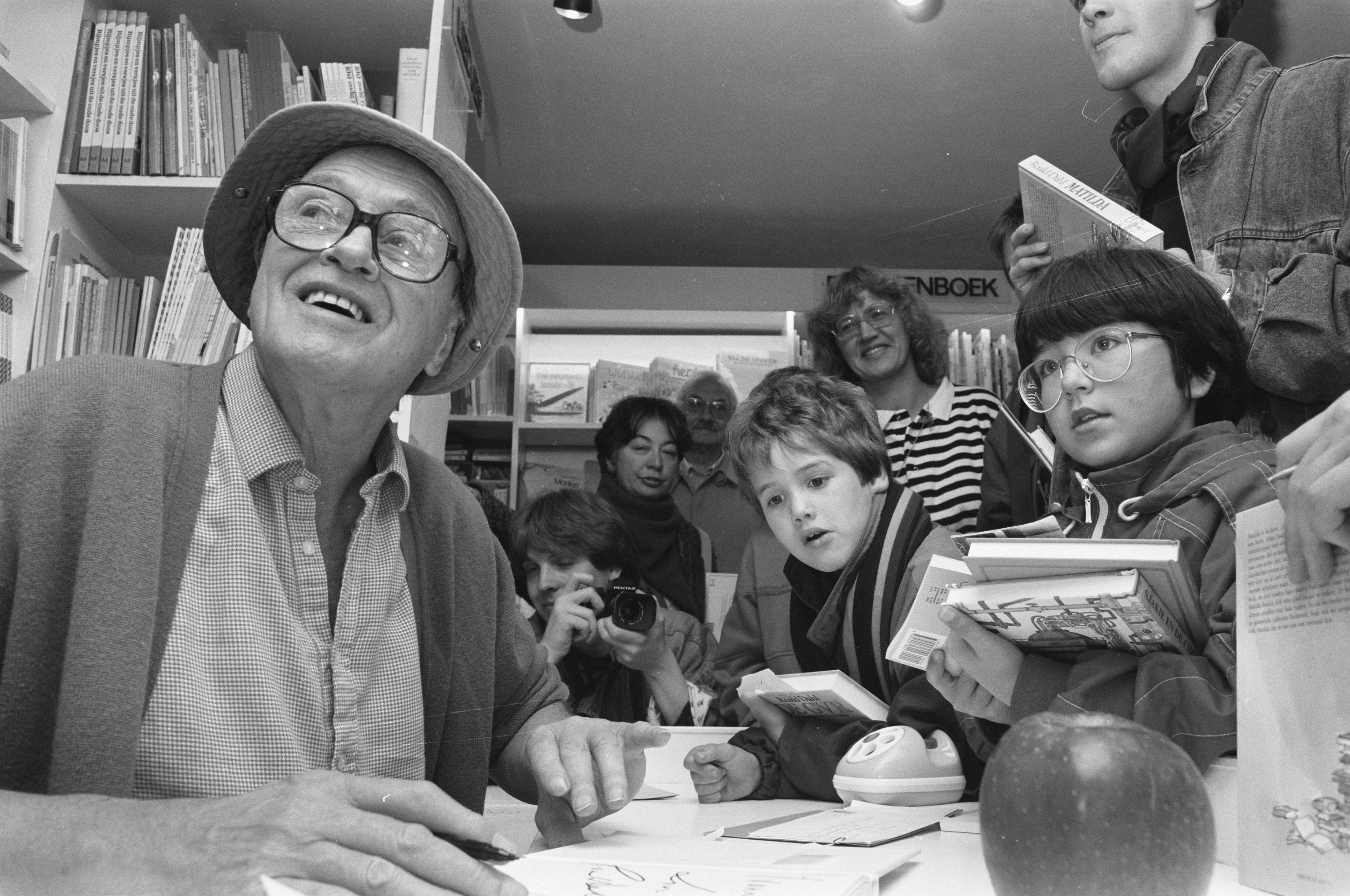 Roald Dahl pictured with his family, symbolizing his unexpected contributions to medicine